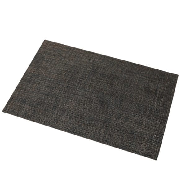 Eco-friendly bamboo fiber table mats featuring a hotel logo, arranged on a rustic wooden table.