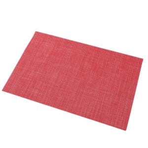 Premium PVC hotel table mats with anti-slip backing and gold-trimmed edges in an elegant dining setup.