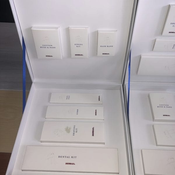 Customizable Hotel Amenity Kits with gold foil branding and 12 color palettes, luxury resort amenities