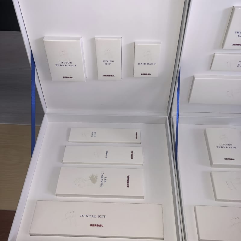 Customizable Hotel Amenity Kits with gold foil branding and 12 color palettes, luxury resort amenities