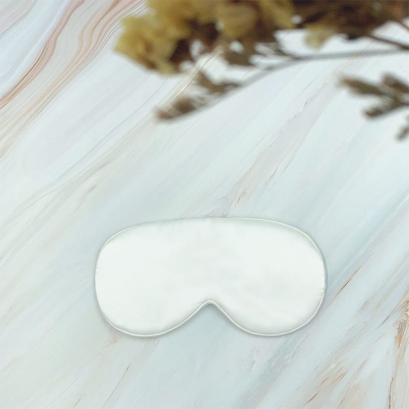 Black satin eye mask with hotel logo embroidery, spa-ready design, hypoallergenic materials, travel-friendly