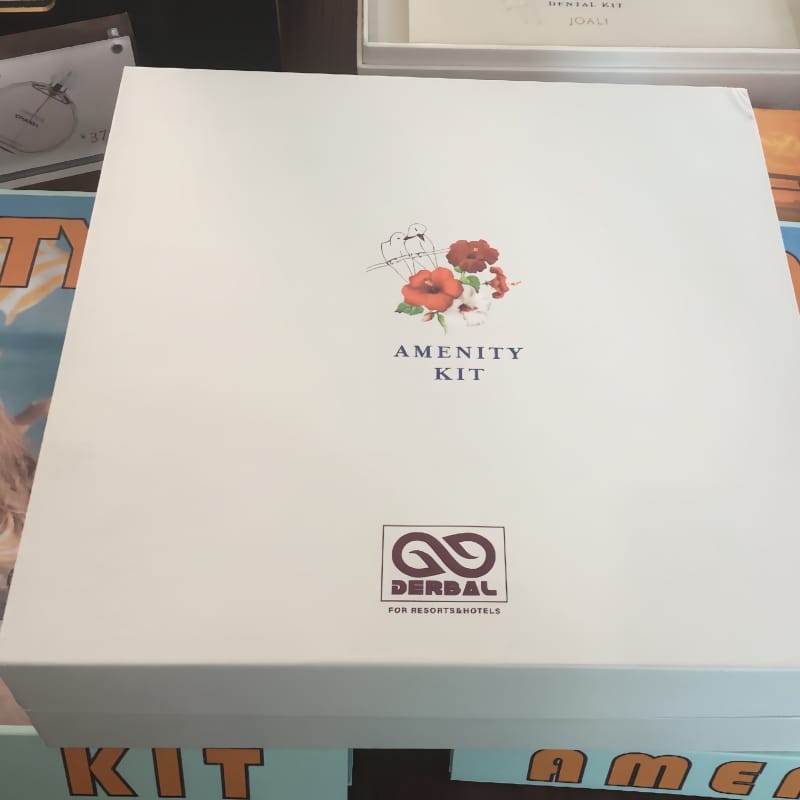 Gender-specific Hotel Amenity Kits with travel-sized hair tools and vegan nail polish removers