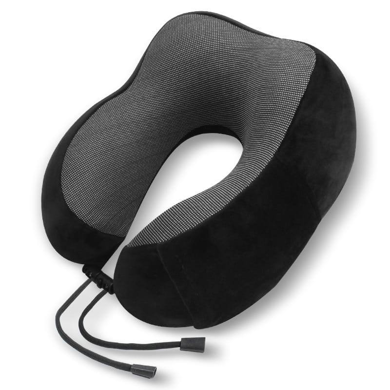 Monochrome travel pillow on hotel bedside table, modern and functional