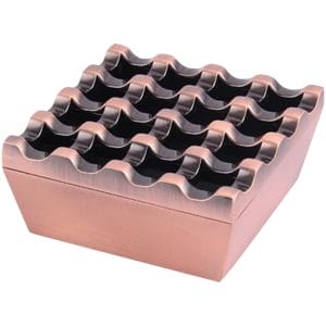 Zinc alloy cigar ashtray with 16-grid design on tropical beach resort table, windproof and modern style