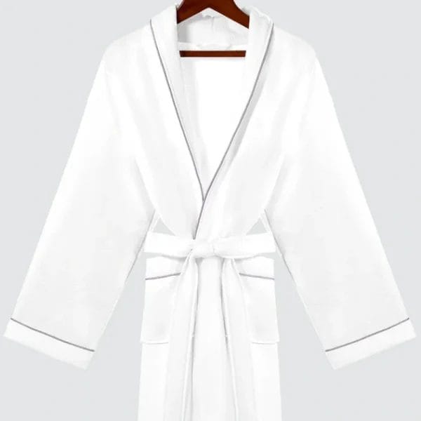 Arctic White luxury hotel bathrobe at Four Seasons Seychelles infinity pool – 650GSM Turkish cotton survives 1,200+ industrial washes.