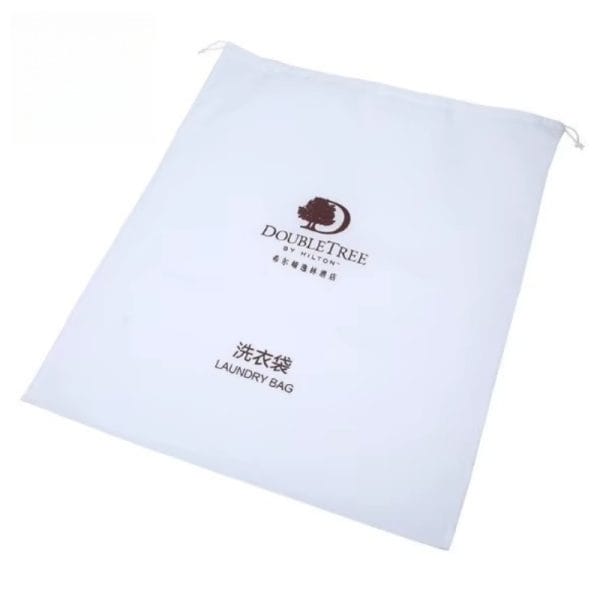 Floral-embroidered laundry bags for Red Sea resort weddings, reusable storage