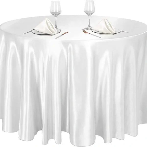Monogrammed "RM" embroidery on DERBAL tablecloth corner with gold thread detail