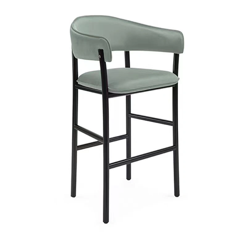 Stainless steel bar stools in Dubai luxury hotel bar with coastal backdrop