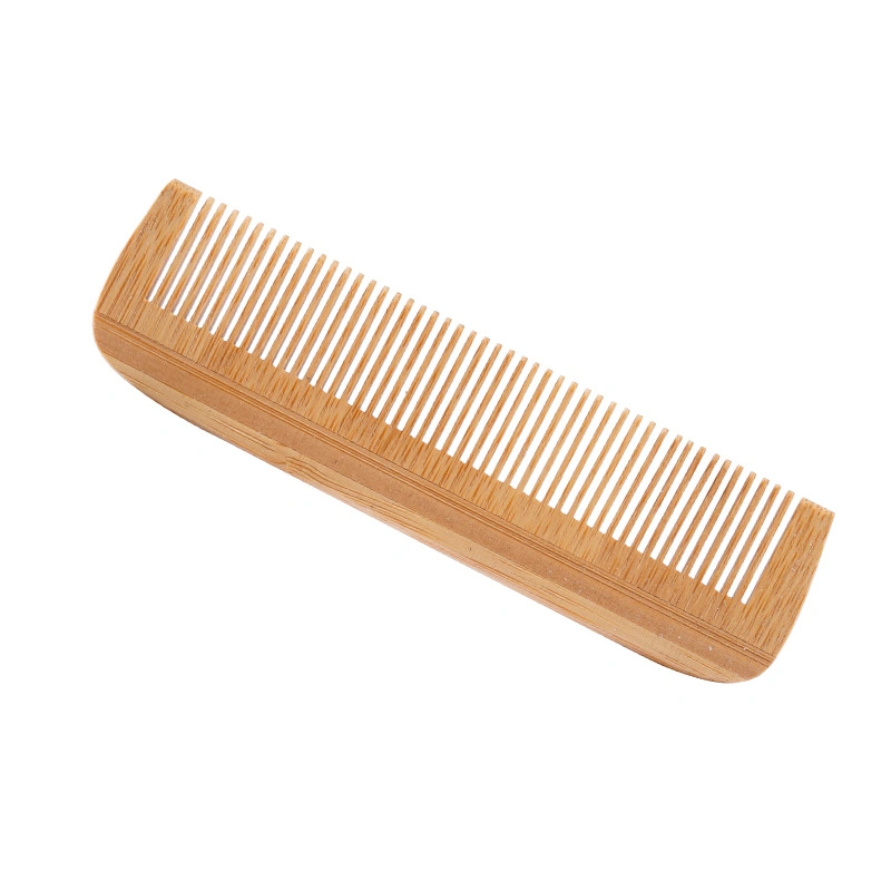 Guest detangling saltwater hair with DERBAL dual-tooth comb on villa balcony