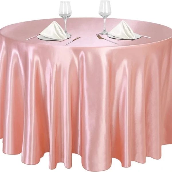 Red wine beading on DERBAL tablecloth at Kempinski Muscat, showing zero absorption after 15-minute exposure