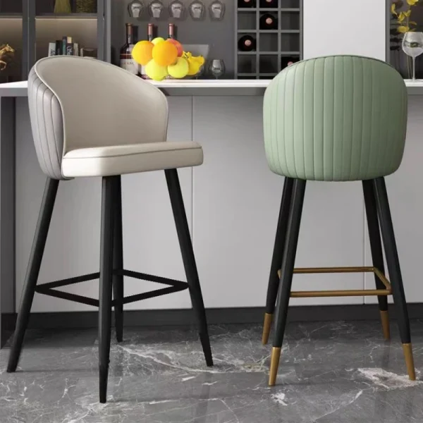 Stacked 16.75"W Bar stools with color-coded bases in hotel supply warehouse