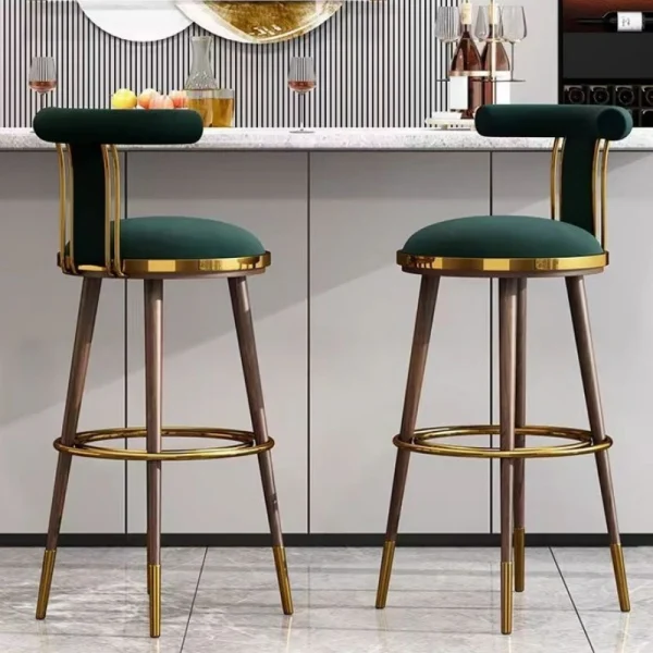 Teak wood-accented bar stools on Seychelles beach with ocean view