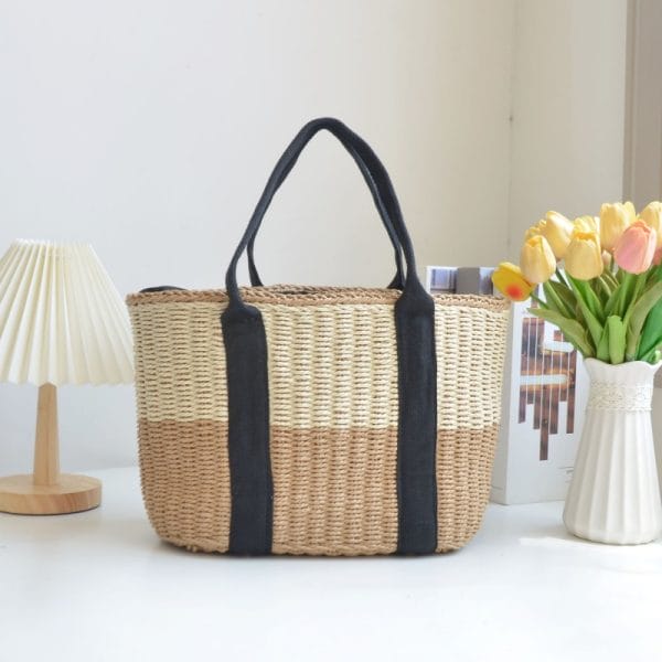 Compact straw tote bag with cartoon prints, family-friendly beach accessory