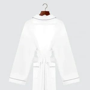 Dust-repellent robe collar at Angama Mara lodge – repels red earth stains with damp wipe.