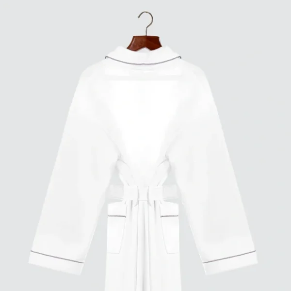 Dust-repellent robe collar at Angama Mara lodge – repels red earth stains with damp wipe.