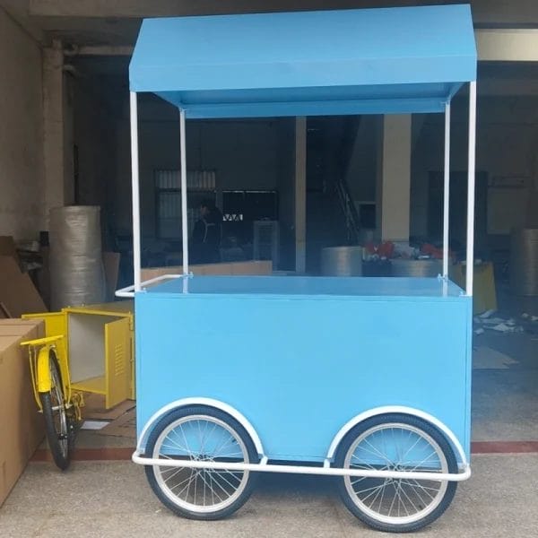 Dual-zone freezer (-18°C to 5°C) in Commercial Ice Cream Cart holding 120+ servings at Soneva Jani Maldives.