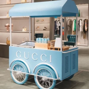 Retro blue Commercial Ice Cream Cart with laser-etched Emirates Palace logo at poolside event.