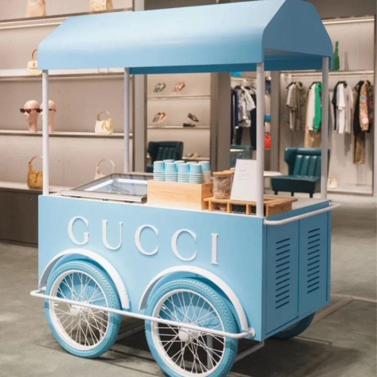 Retro blue Commercial Ice Cream Cart with laser-etched Emirates Palace logo at poolside event.