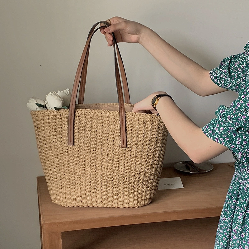 Straw Beach Tote Bag representing DERBAL's commitment to premium quality and craftsmanship.