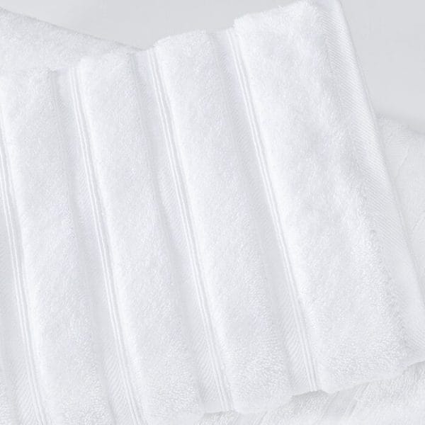 Recycled-material Hotel Bath Towels in carbon-neutral villa at North Island Seychelles.