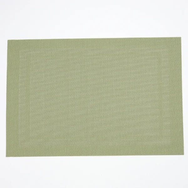 A dining table elegantly set with Hotel Table Mats featuring a sophisticated basketweave texture.