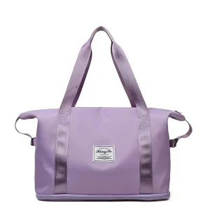 The Foldable & Expandable Travel Bag with its bottom expansion zipper unzipped, showing extra capacity.