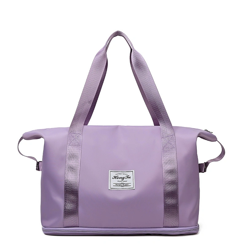 The Foldable & Expandable Travel Bag with its bottom expansion zipper unzipped, showing extra capacity.