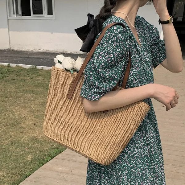 Front view of a handmade Straw Beach Tote Bag with natural woven texture.