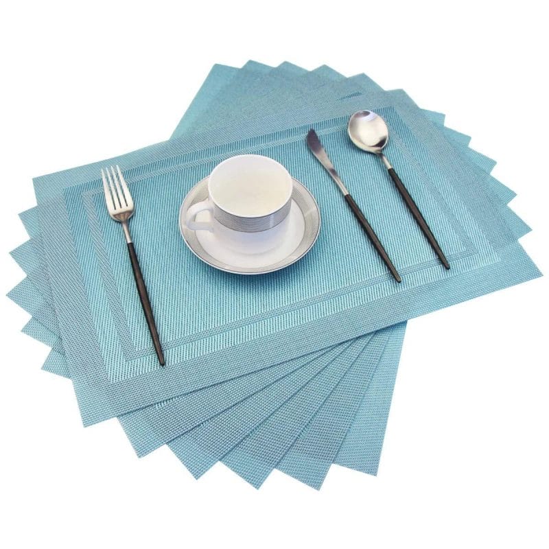 Hotel Table Mats protecting a table from a hot dish, showcasing heat resistance up to 80℃.