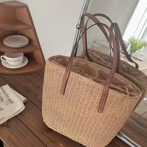 The Straw Beach Tote Bag completing a stylish summer outfit.