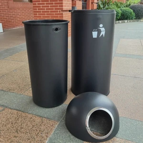 Hotel Outdoor Bins standing resiliently in various weather conditions like rain or bright sun.