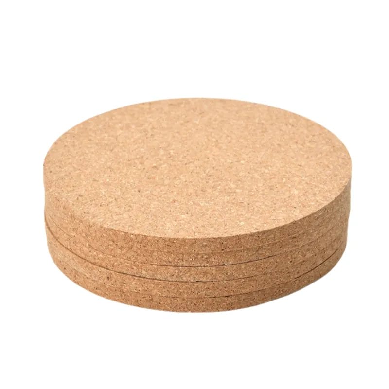 Cork Coasters in a coffee shop setting, highlighting its 90mm size that saves space on the counter.