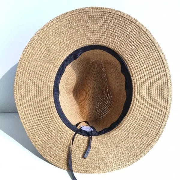 A detail shot of the adjustable inner band of the Panama hat Straw Sun Hat for a customized and secure fit.