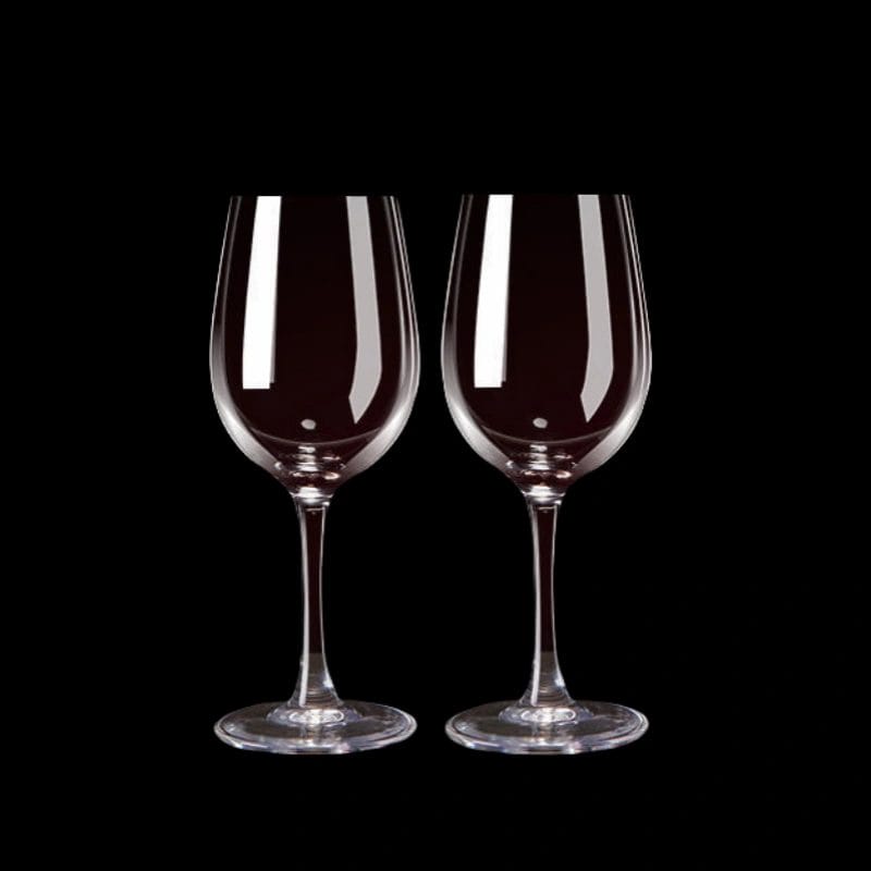 A person inspecting the high-quality, clear glass of the Red wine glasses for visual clarity.