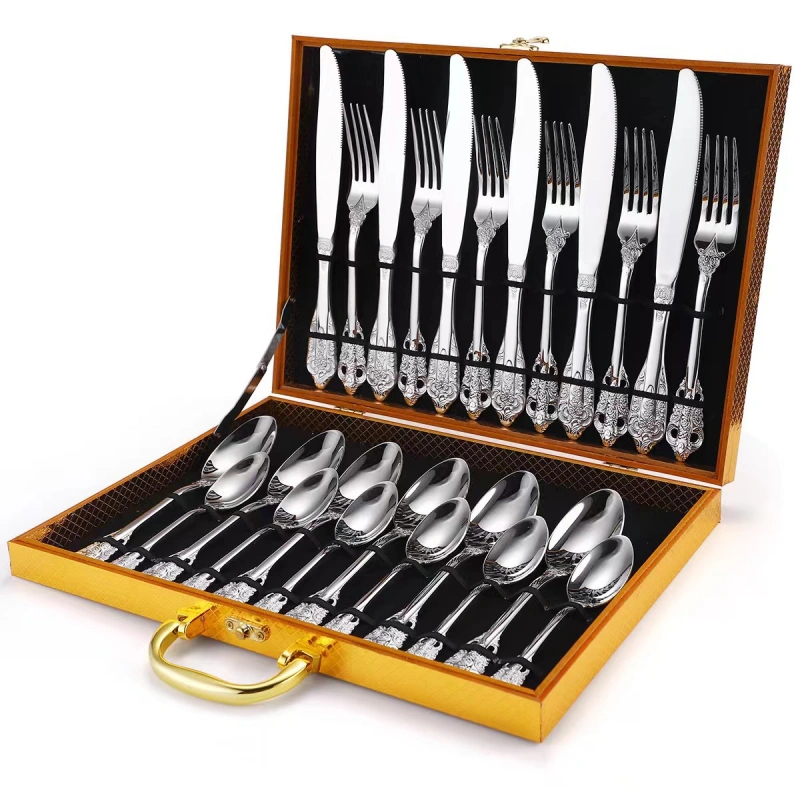 A complete 24-piece Retro Royal Silverware Set Stainless Steel Cutlery laid out with forks, spoons, and knives.