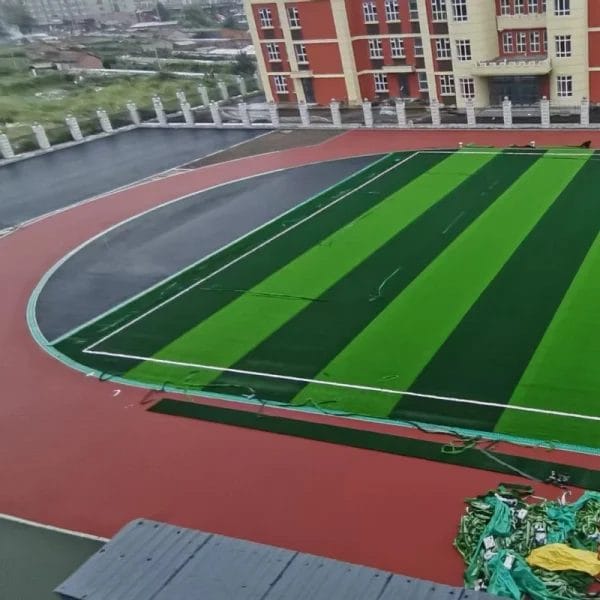 A wide shot of a perfectly level Football Turf pitch, showing a consistent playing surface for fair ball roll and bounce.