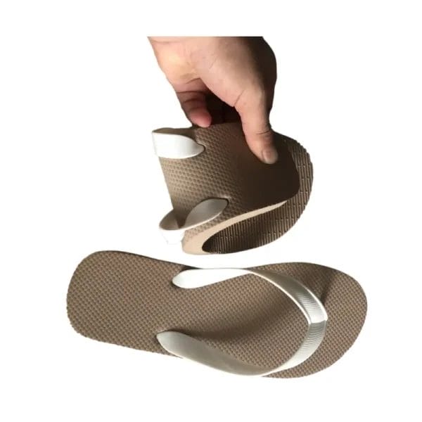 A display of multiple pairs of Outdoor Beach Flip Flops Cheap Slippers, visually communicating affordability and value for bulk purchasing.