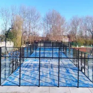 Guests actively enjoying a social game of doubles on a Padel Court, emphasizing the sport's fun and social nature.
