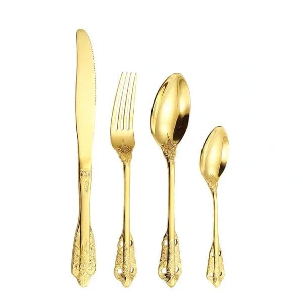 A person holding a piece from the Retro Royal Silverware Set Stainless Steel Cutlery, demonstrating its comfortable and ergonomic design.