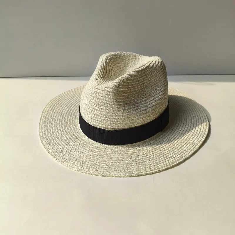 A close-up of the high-quality natural paper straw material of the Panama hat Straw Sun Hat, showcasing its breathable texture.
