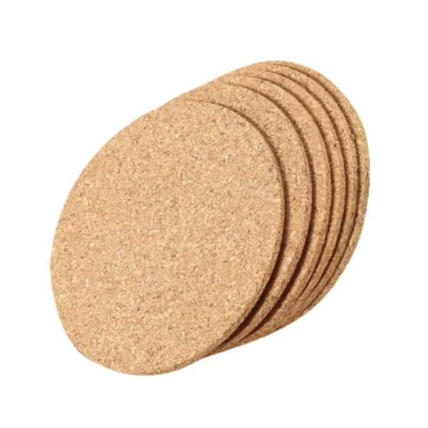 Cork Coasters with a hot mug on top, showing its non-slip surface and heat protection feature.