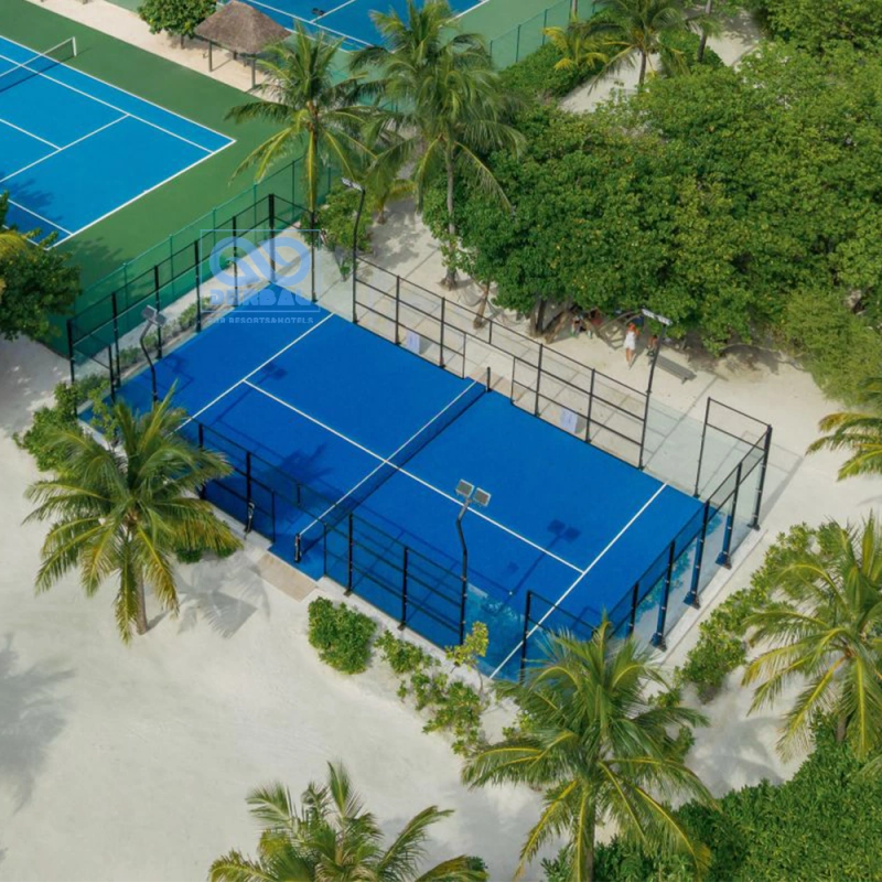 A panoramic Padel Court at a luxury resort, offering players unobstructed views of the scenery.
