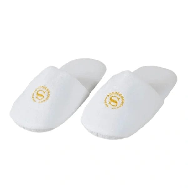 A close-up of the plush texture of the Hotel Velour Slippers, emphasizing the soft feel.