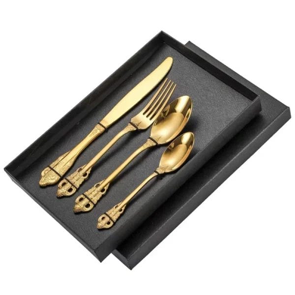 The steak knives from the Retro Royal Silverware Set Stainless Steel Cutlery showing their serrated blades and unique laser print.