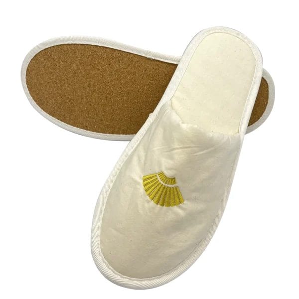 A side-angle shot of a Cotton Cork Sole Slippers showcasing the distinct layers of breathable cotton and the natural cork sole.