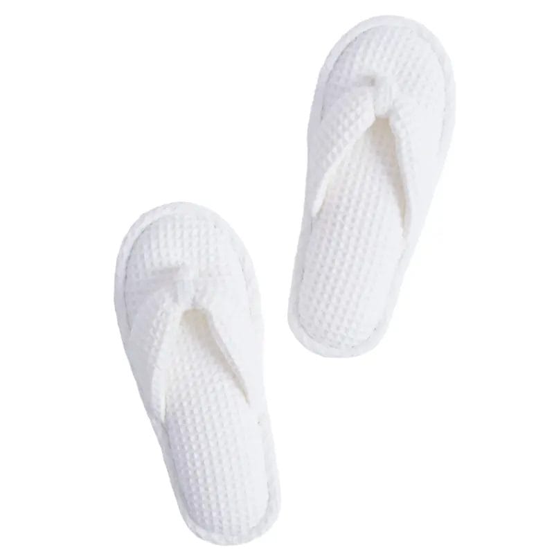 An image of a Waffle Slippers with a hotel's logo elegantly embroidered on the top, highlighting customization for brand identity.
