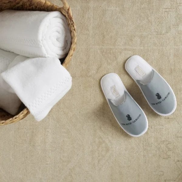 Guest Wearing Luxe Hotel Microfiber Slippers