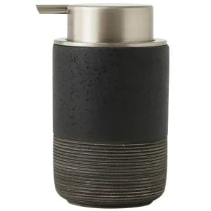 A close-up of the durable and modern matte black pump mechanism on a white ceramic Foaming Soap Dispenser, highlighting its premium, non-corrosive finish.