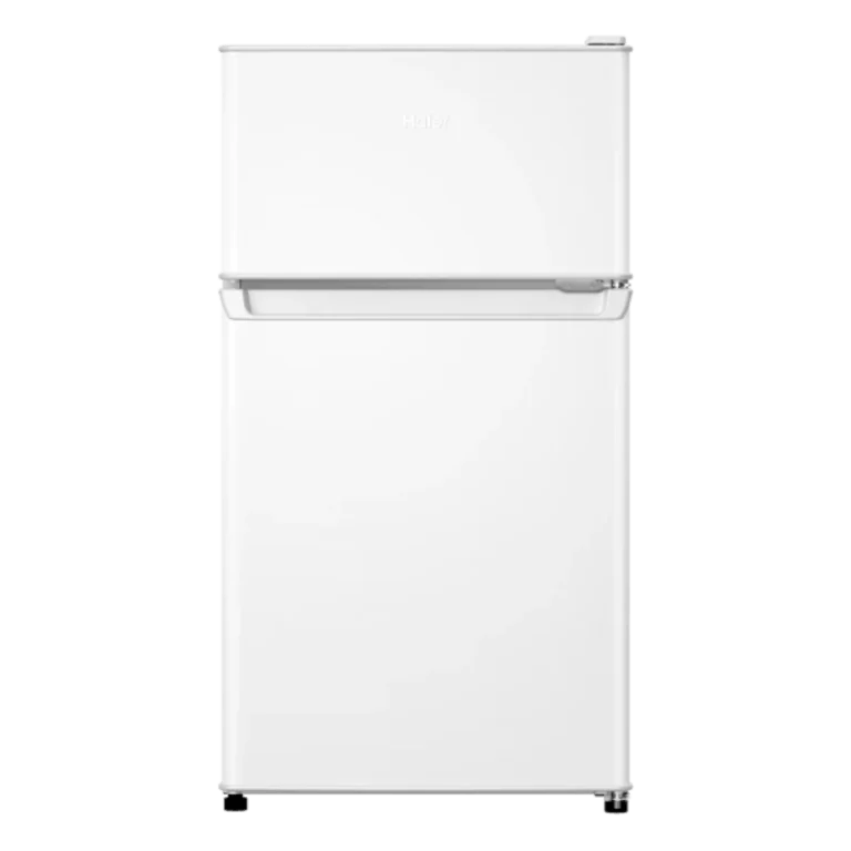 A view of the HaiEr MINI FRIDGE discreetly built into a hotel cabinet, emphasizing its ultra-quiet operation.