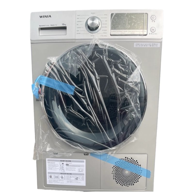 A view inside the open door of the Hotel Front Load Electric Dryer showing the high-capacity Stainless steel inner drum.